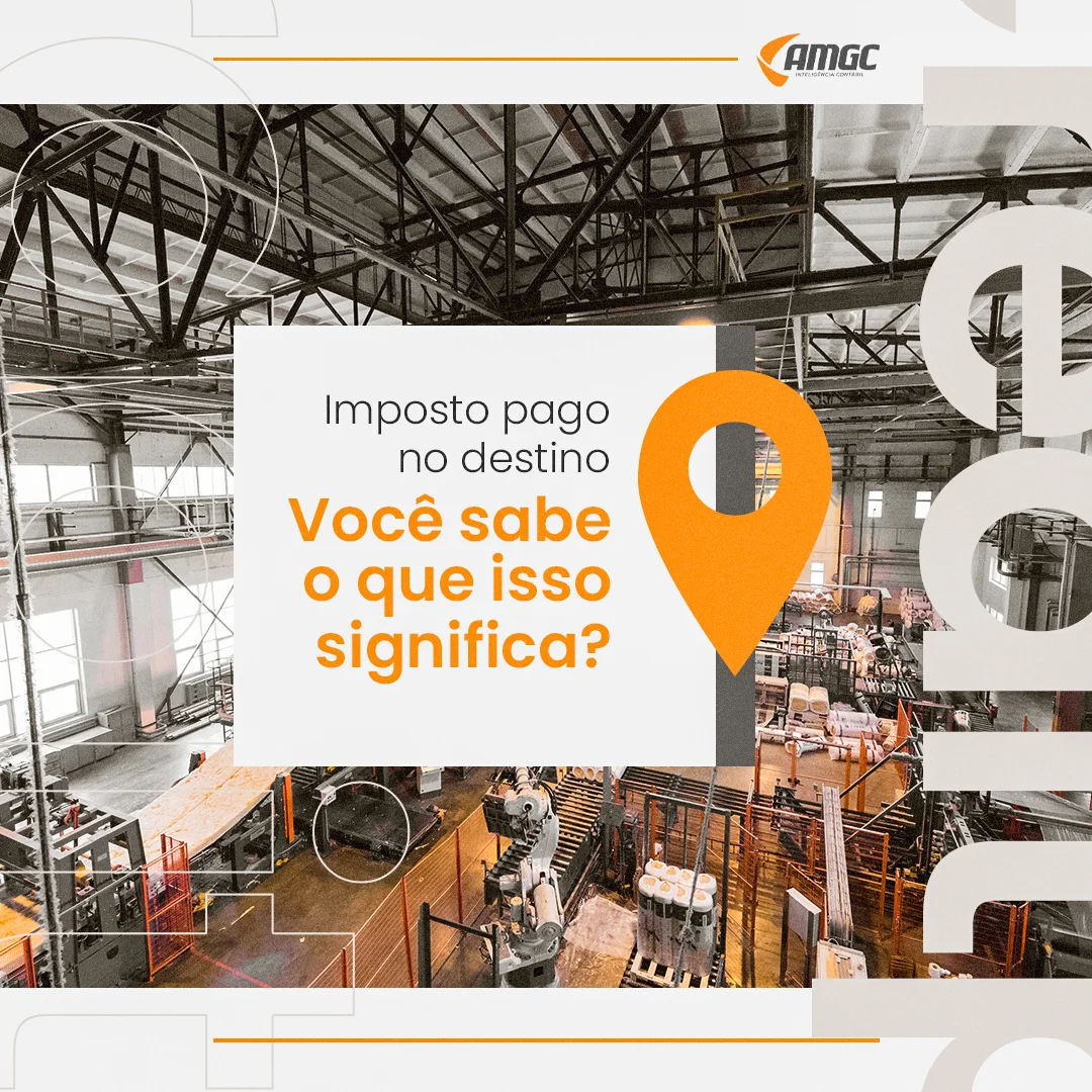 Interior de galpão industrial com marcador de localização em post da AMGC sobre imposto pago no destino