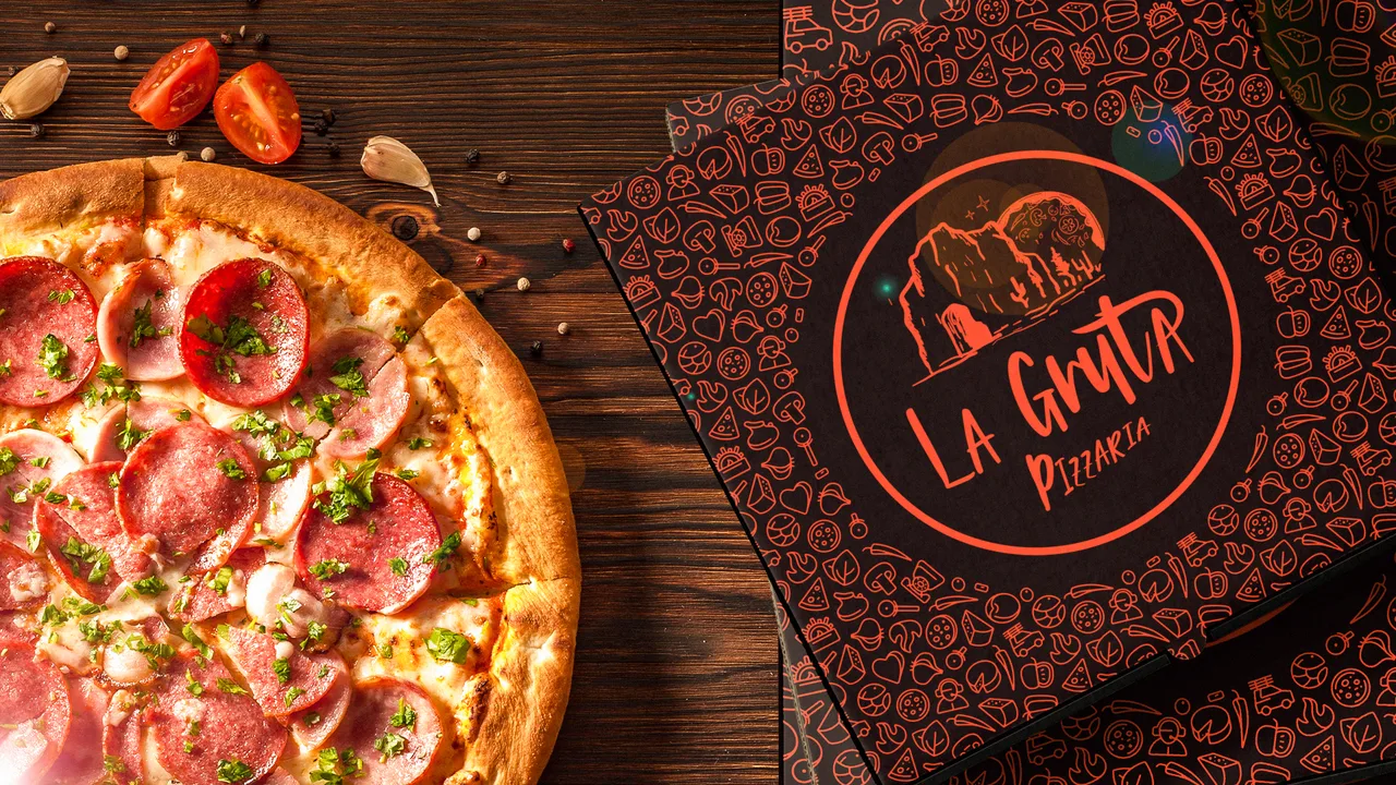 Proposta 1 em preto e laranja na embalagem — La Gruta Pizzaria